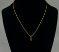 16" evoke gold chain with red stone pendent