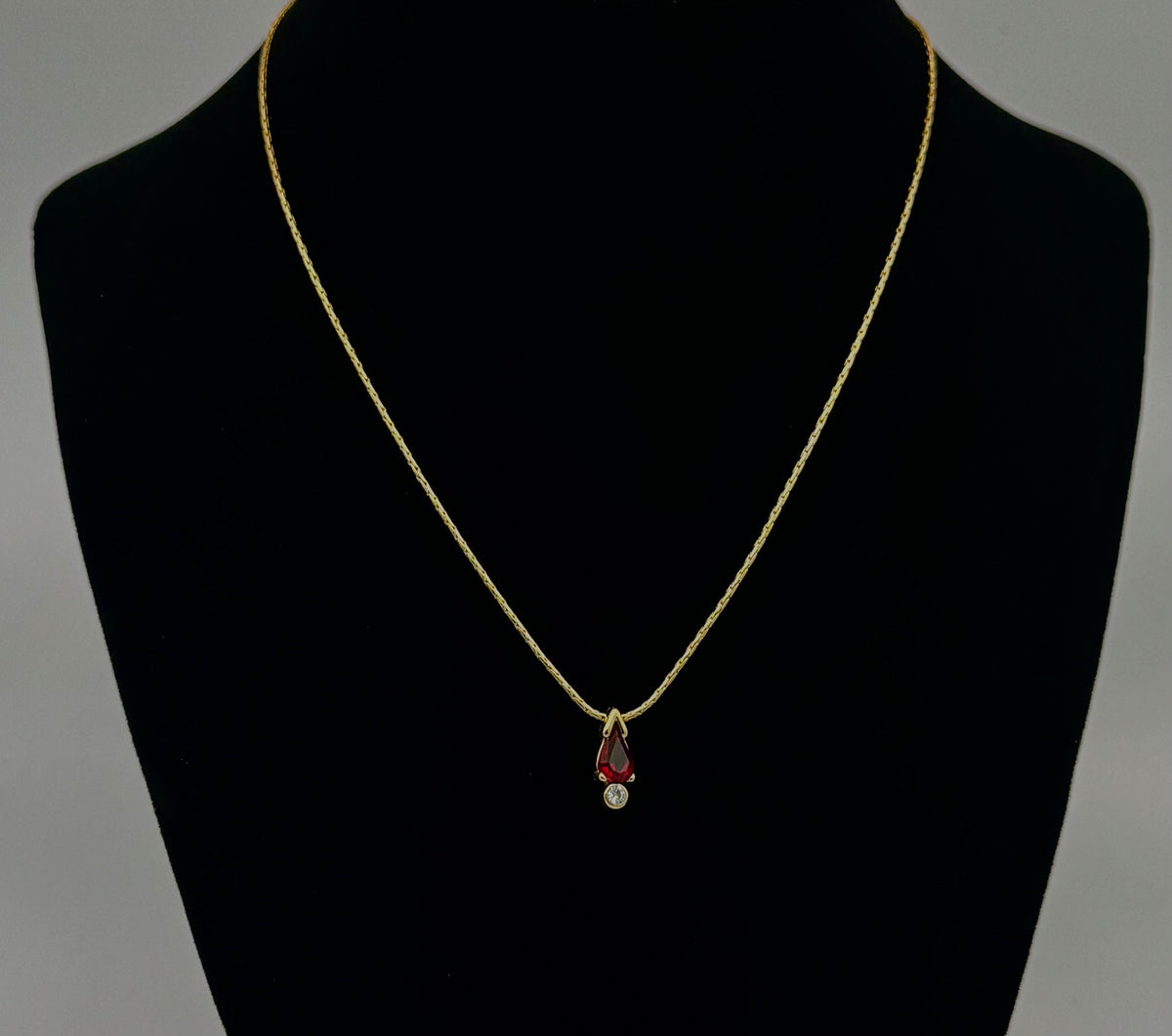 16" evoke gold chain with red stone pendent